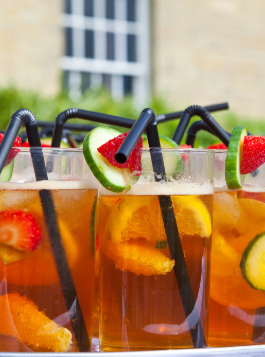 Pimms cocktails on a tray outside wedding venue
